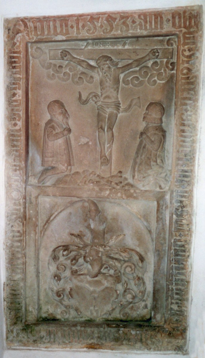 Vault cover with two kneeling figures before a crucifix at top; Schwenckfeld family Coat of Arms on bottom; found on an inside wall of the Church at Ossig